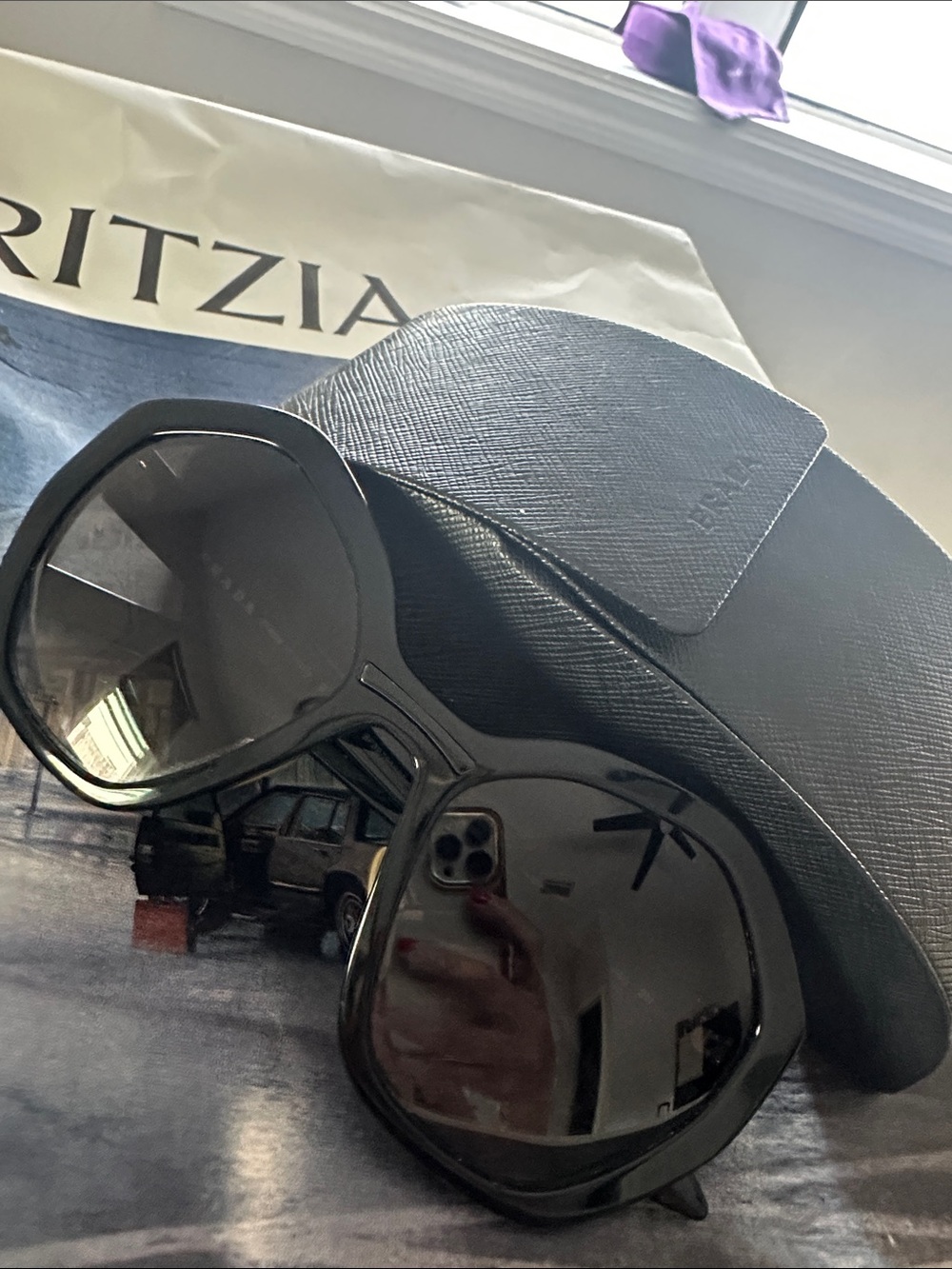 Prada Black Oversized Round Sunglasses with Textured Case